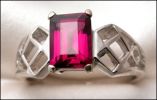 ROYAL RHODOLITE GARNET (India) SET IN 14K WHITE GOLD � 9 X 7 MM.